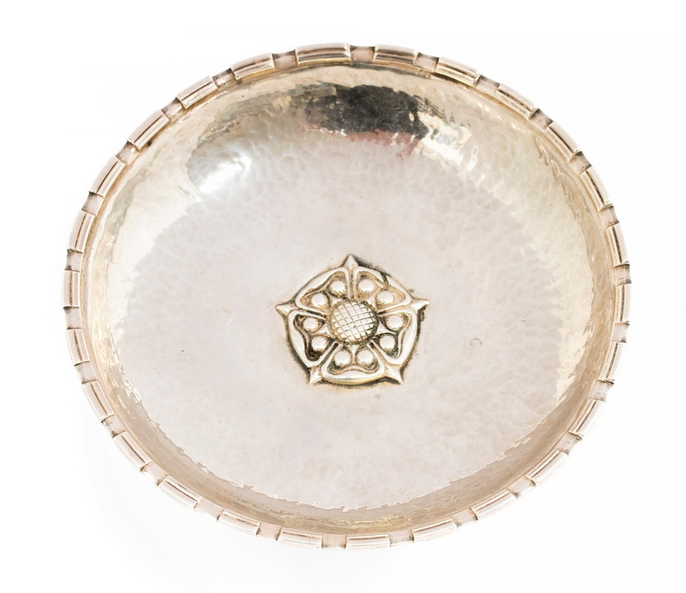 Omar Ramsden, an Arts and Crafts silver dish, shallow, planished form with denticulated fluted rim, - Image 2 of 3
