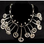 Pablo Picasso (attributed), a white metal necklace, abstract cut sheet metal hanging swirls,