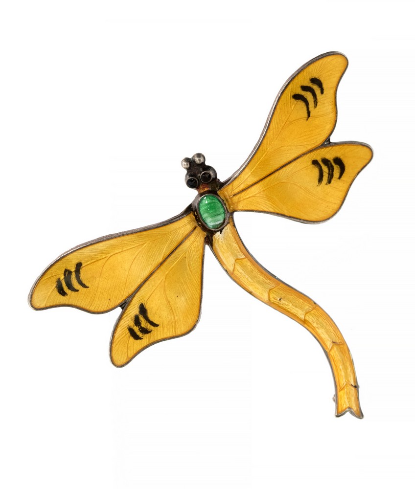 An enamelled silver dragonfly brooch, yellow enamel wings, green body and black eyes,