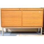 A 1950s teak and aluminium framed sideboard cabinet,