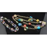 A 1960s candy charm necklace with various Murano enamelled metal and resin beads on gilt chain,