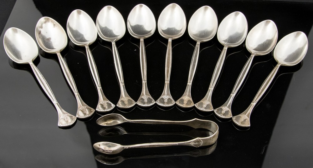 A set of ten Arts and Crafts silver teaspoons in the Art Nouveau style,