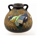 An Art Deco Amphora vase, squat twin handled form with incised and enamelled bird and flower,