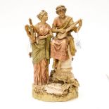 A Royal Dux figure group of male and female musicians, in Ancient Greek costume, 134,