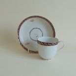 A Derby coffee cup and saucer, circa 1780, puce mark, cup, 6 cm diameter approx, 5.
