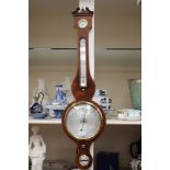 A barometer with paper label for Garney and Marney Ltd London