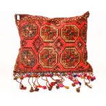A large Afghan saddle bag cushion,