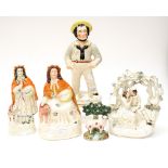 Staffordshire figures, including Red Riding Hood, Sailor,