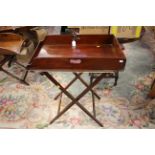 George III mahogany butlers tray on folding stand