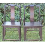 A pair of Chinese hardwood armchairs, 17th century or later, probably padouk,