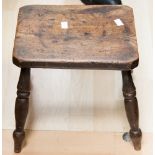 A 19th Century elm footstool,