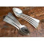 A matched set of ten George III Old English Pattern dessert spoons, each engraved with initials,