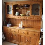 A contemporary traditionally made pine dresser and rack,