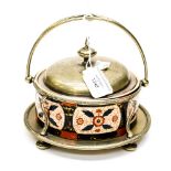 A Macintyre Imari butter dish on EPNS stand, with cover,