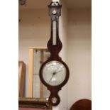 A 19th Century wheel barometer and thermometer,