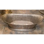 A plated copper wine cooler trough,