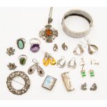 A quantity of various silver jewellery, including bangle, dress rings, brooches, earrings, pendants,