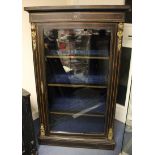 A late 19th Century ebonised pier cabinet, the sides with ormolu mounts,
