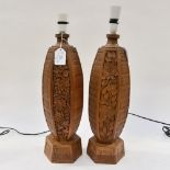 A pair of hand carved hardwood lamp bases,