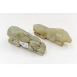Two carved jade figures,