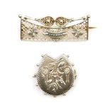 Two Victorian silver tennis brooches, one with two rackets,