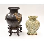 A Celadon type Chinese vase, embellished with dragons, with a Chinese vase,