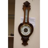 A 20th Century Banjo barometer and thermometer, by H.L.