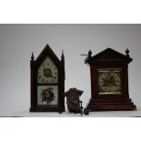 A Victorian mantle clock with brass fittings,