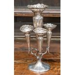A George V silver epergne with central posy vase with pierced flared rim and three further trumpet