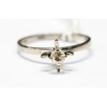 A diamond 18ct white gold solitaire ring, the fancy set diamond weighing approximately 0.