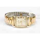 A 1930s Nidor Swiss gentlemans bracelet watch, subsidiary dial, bowed glass,