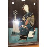 A Chinese print backed on glass, framed,