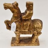 A cast figure of horse with rider,