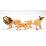 A Beswick lion family including lioness,