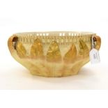 A Royal Worcester blush ivory leaf moulded bowl, with curled fronds and pierced rim details,