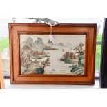 A framed Chinese ceramic plaque, handpainted with mountains and lake scene,