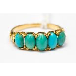 A turquoise five stone yellow gold ring, size O, approx 3.