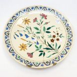 A Dutch Delft 19th century wall plaque with rivet repairs,