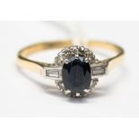 A sapphire and diamond 18ct yellow gold and platinum set fancy cluster ring,