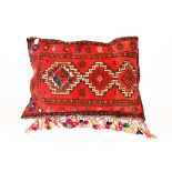 A large Afghan saddle bag cushion,