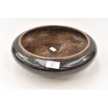 A copper closone shallow bowl, having five toed dragon to the centre,