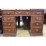 An Edwardian pedestal desk,