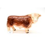 An English earthenware figure of a Hereford Bull