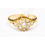 An 18ct gold and diamond cluster ring, set with rose cut diamonds, Birmingham 1878,