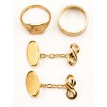 A pair of 9ct gold cufflinks with oval and figure of eight terminals,