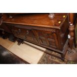 An Edwardian oak sideboard,