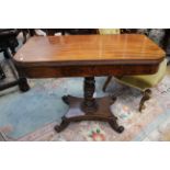 An early Victorian mahogany fold over card table,