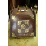 An early 20th Century mahogany and brass mounted coal scuttle