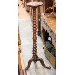 A Victorian walnut barley twist jardiniere stand