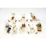 Eight Royal Crown Derby miniature Teddy Bears: Graduate Bear, Golfer Bear, Edward Bear,